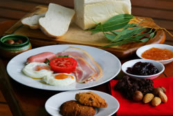 Breakfast includes homemade jams and hot baked bread, cereal and juice.